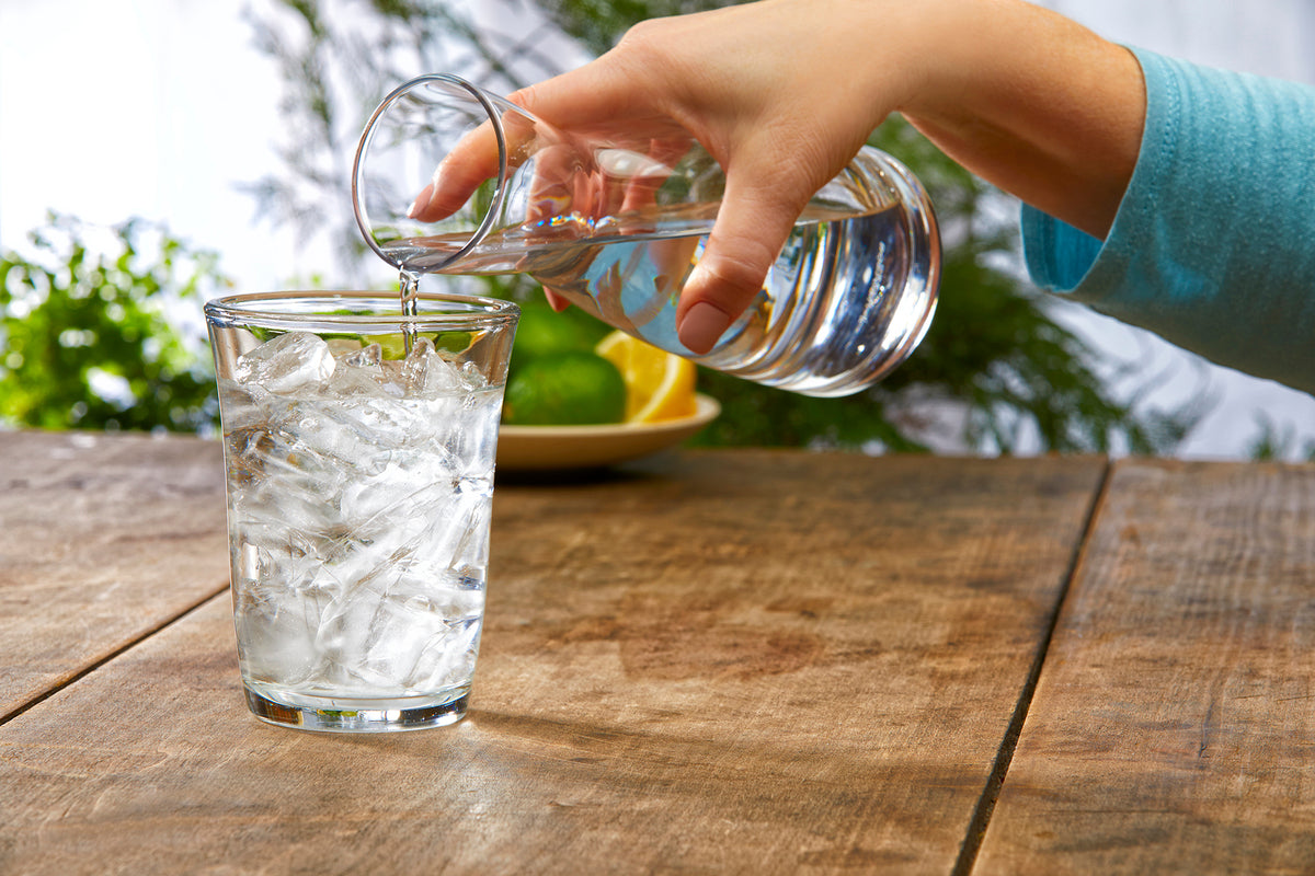 Pouring Culligan with ZeroWater Technology filtered water into glass