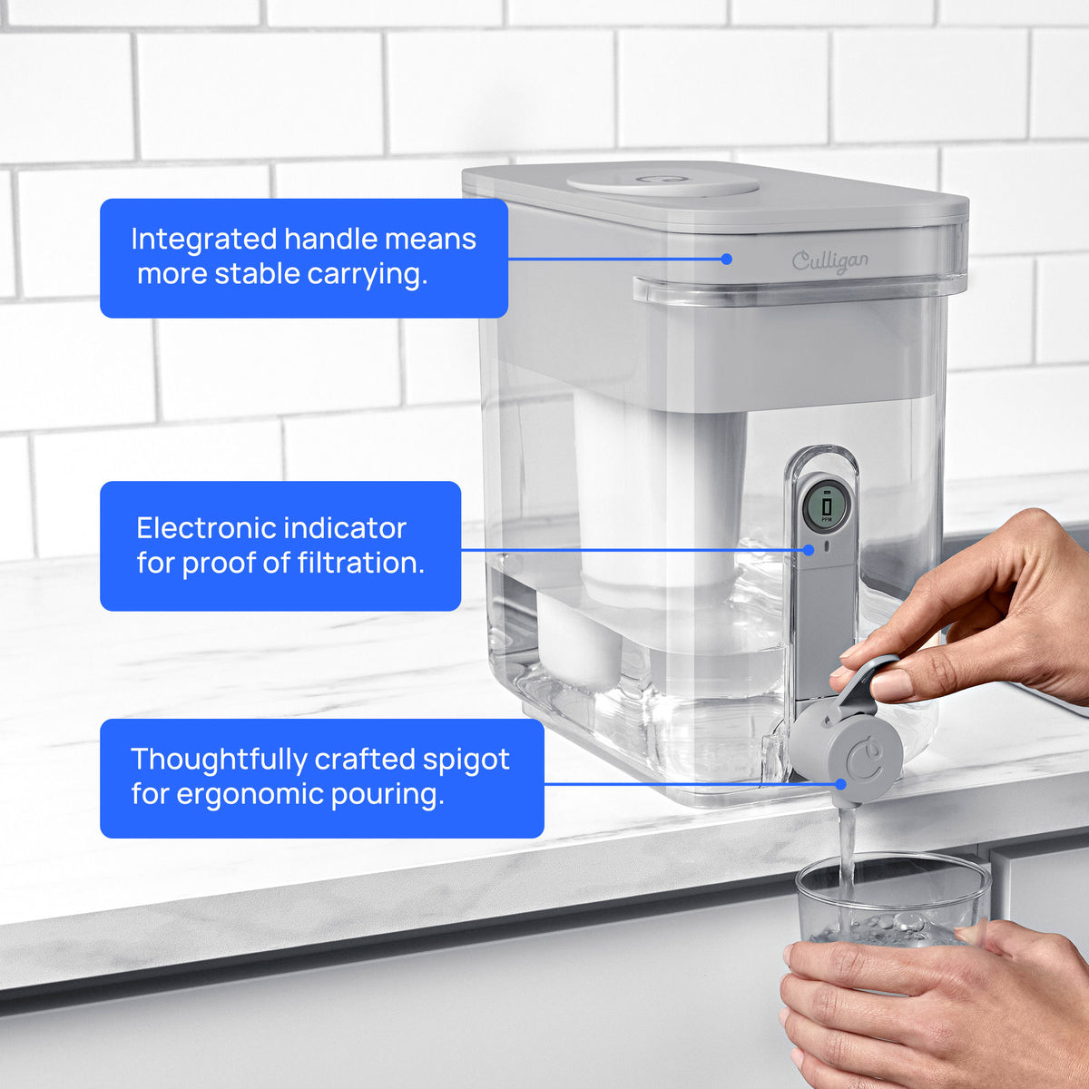 person using water spigot on 22 cup zerowater dispenser