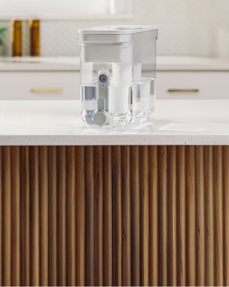32 cup ZeroWater dispenser on kitchen counter with TDS meter