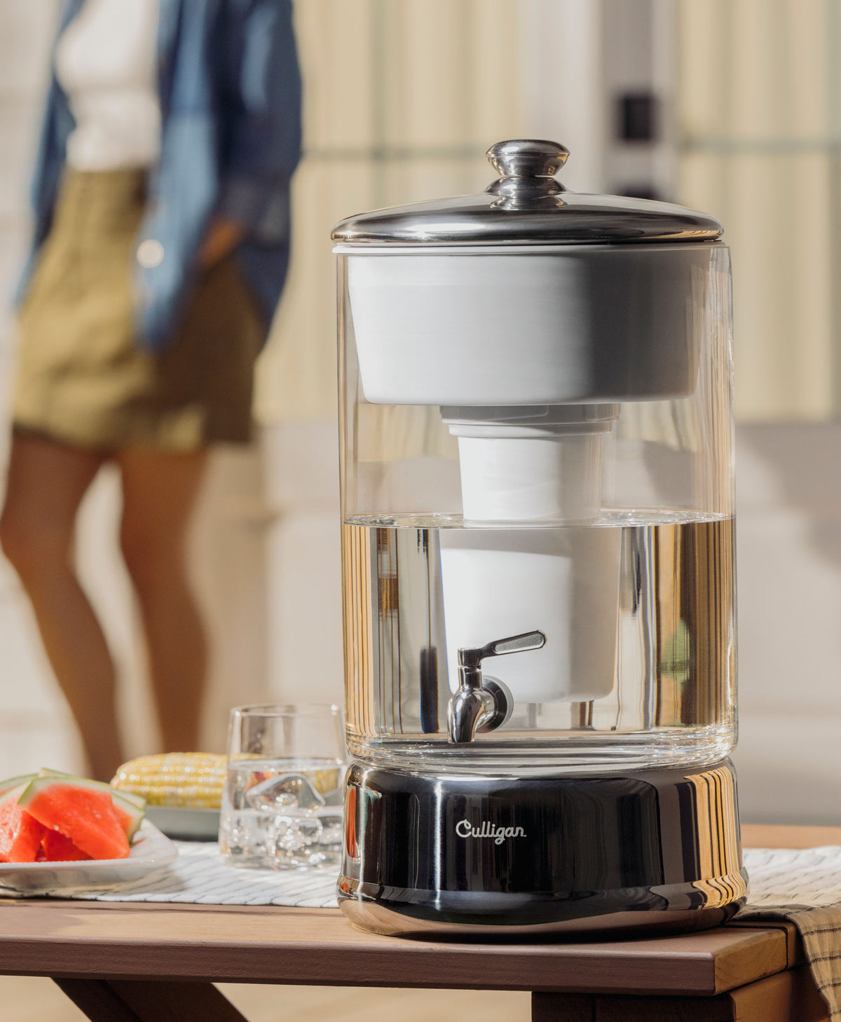 40 cup zerowater dispenser on picnic table next to food and drink