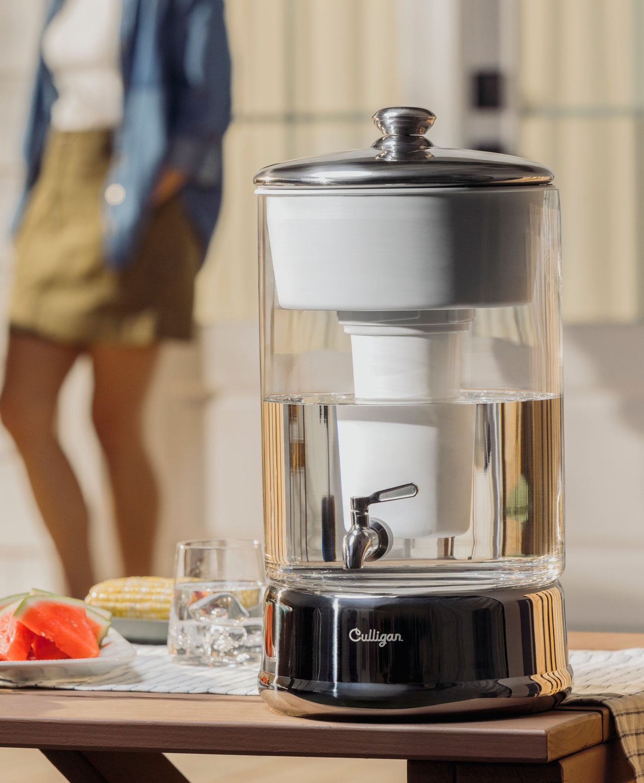 40 cup zerowater dispenser on picnic table next to food and drink