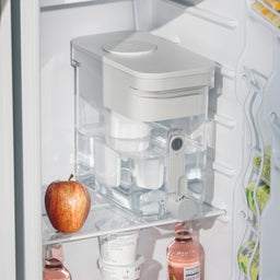 22 cup zerowater dispenser in refrigerator next to apple